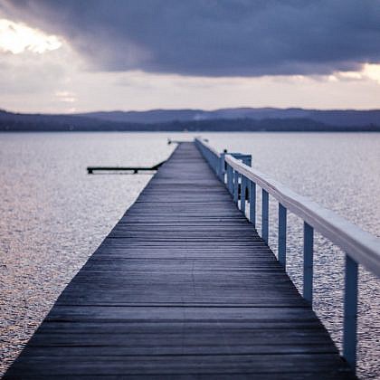 Jetty under a stormy sky