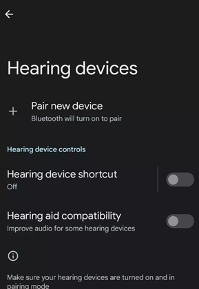 Screenshot of Hearing device set up page. Black back ground with white lettering, links include Pair new Device, Hearing Device Shortcut and Hearing aid compatibility