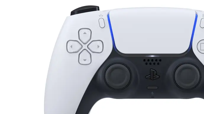 A closeup of the black and white PlayStation 5 console. 