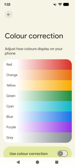The Colour correction settings menu on an Android device. The colours red, orange, yellow, green, cyan, blue, purple, and grey are shown from full brightness and no saturation on the left (pure white) fading to full saturation and medium brightness. A toggle for 'Use colour correction' is below the bands of colour.